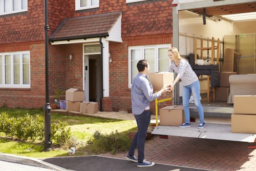 Professional house removals planning in Wallington with moving boxes and transport preparation